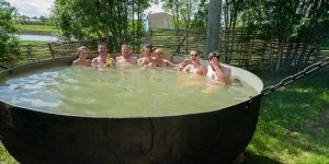 Bathing tub on wood (20 photos)